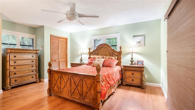 10123 Vestal Ct, Coral Springs, FL 33071 - bedroom featuring light wood finished floors, a closet, ceiling fan, and a textured ceiling