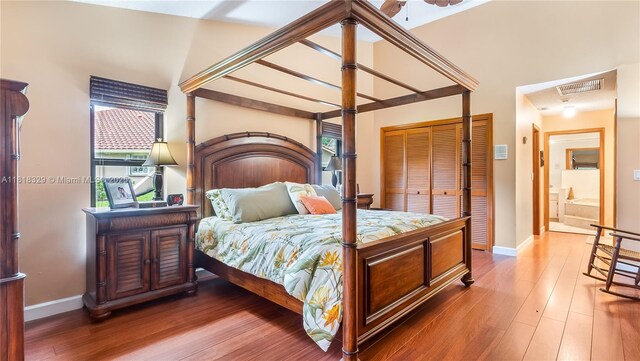 10123 Vestal Ct, Coral Springs, FL 33071 - bedroom with wood finished floors and multiple windows