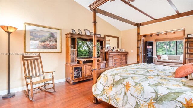 10123 Vestal Ct, Coral Springs, FL 33071 - bedroom featuring vaulted ceiling and wood finished floors