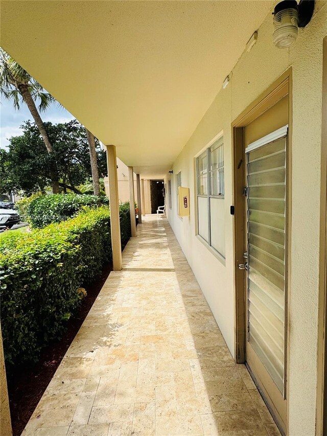 2304 Lucaya Ln Unit J1, Coconut Creek, FL 33066 - view of patio / terrace with area for grilling and a carport