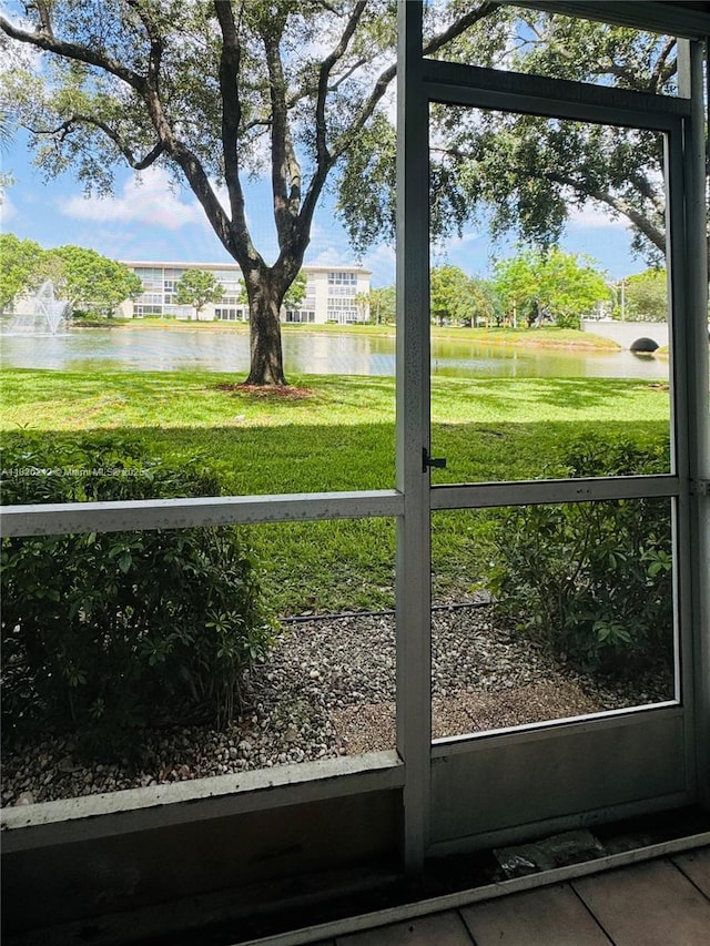 2304 Lucaya Ln Unit J1, Coconut Creek, FL 33066 - doorway with a water view