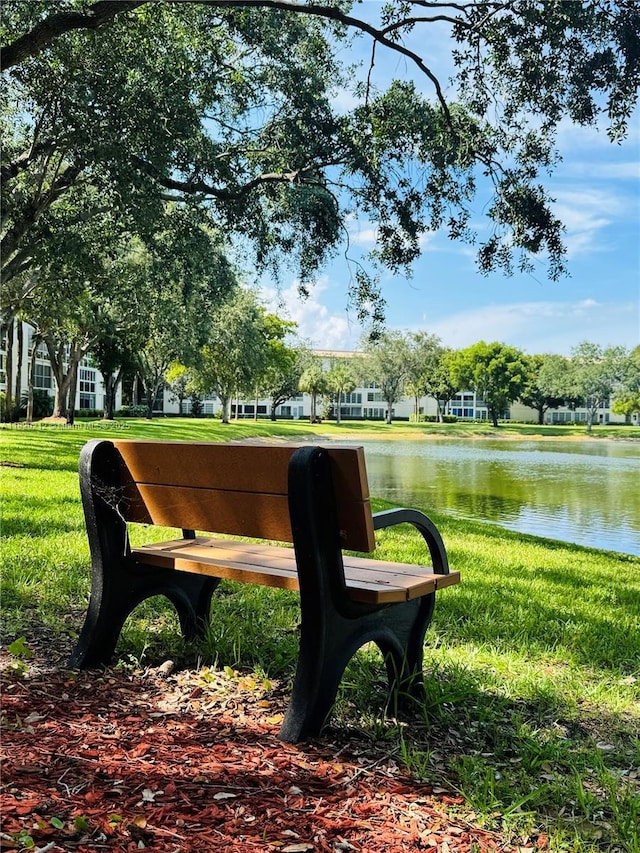 2304 Lucaya Ln Unit J1, Coconut Creek, FL 33066 - view of home's community with a water view and a lawn