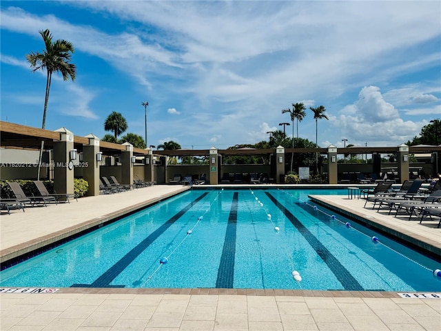 2304 Lucaya Ln Unit J1, Coconut Creek, FL 33066 - community pool featuring a patio