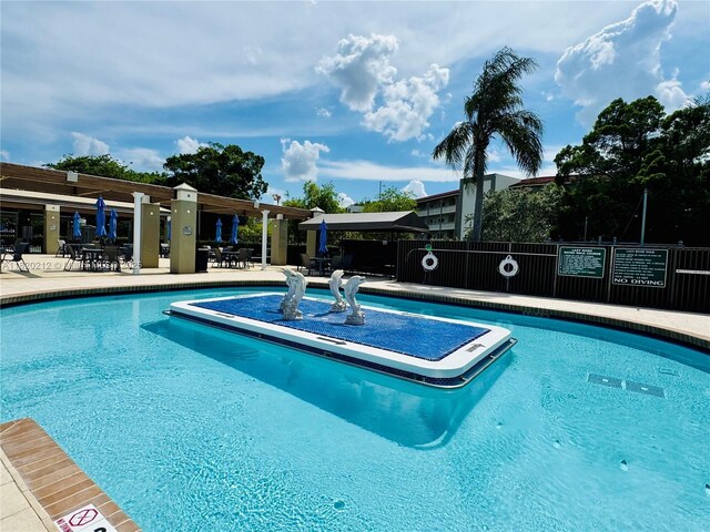 2304 Lucaya Ln Unit J1, Coconut Creek, FL 33066 - community pool with a patio