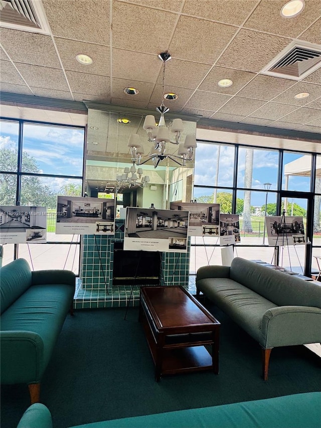 2304 Lucaya Ln Unit J1, Coconut Creek, FL 33066 - living area featuring healthy amount of natural light, a chandelier, recessed lighting, and carpet flooring