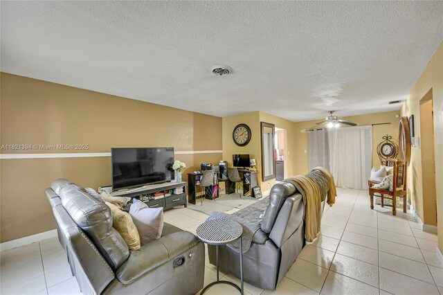5340 SW 11th St, Margate, FL 33068 - living area with light tile patterned flooring, ceiling fan, and a textured ceiling