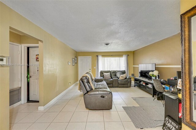 5340 SW 11th St, Margate, FL 33068 - living room with light tile patterned floors and a textured ceiling