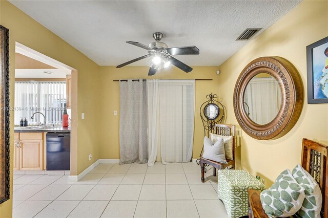 5340 SW 11th St, Margate, FL 33068 - living area featuring ceiling fan, light tile patterned flooring, and a textured ceiling