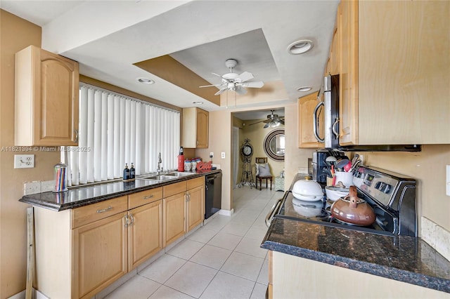 5340 SW 11th St, Margate, FL 33068 - kitchen featuring light tile patterned floors, a ceiling fan, stainless steel appliances, a raised ceiling, and light brown cabinetry