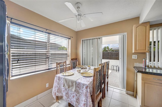 5340 SW 11th St, Margate, FL 33068 - dining space with a ceiling fan, light tile patterned floors, and light colored carpet
