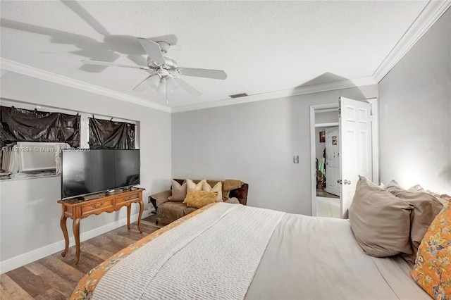 5340 SW 11th St, Margate, FL 33068 - bedroom featuring crown molding, wood finished floors, cooling unit, and ceiling fan