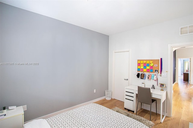 10857 NW 84th St, Doral, FL 33178 - bedroom featuring light wood-style floors and baseboards