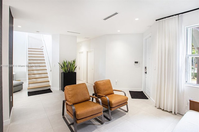 10857 NW 84th St, Doral, FL 33178 - sitting room featuring stairway, light tile patterned floors, and recessed lighting