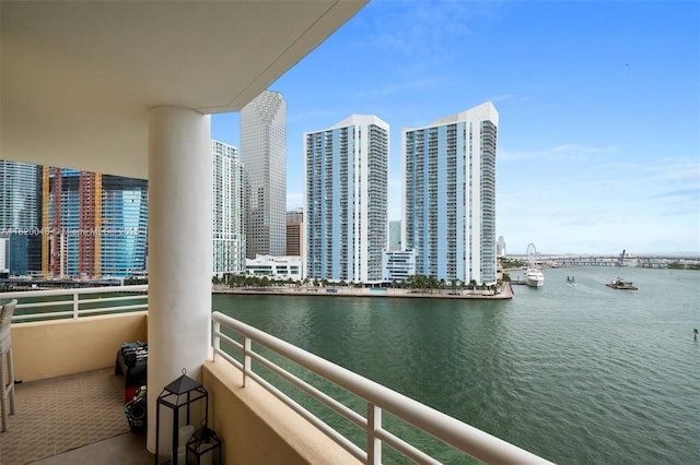 888 Brickell Key Dr Unit 1006, Miami, FL 33131 - balcony with a water view and a view of skyline