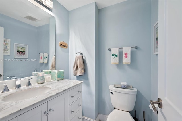 888 Brickell Key Dr Unit 1006, Miami, FL 33131 - bathroom with vanity and toilet