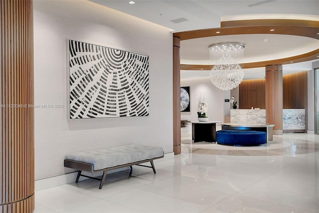 888 Brickell Key Dr Unit 1006, Miami, FL 33131 - reception with a chandelier and recessed lighting