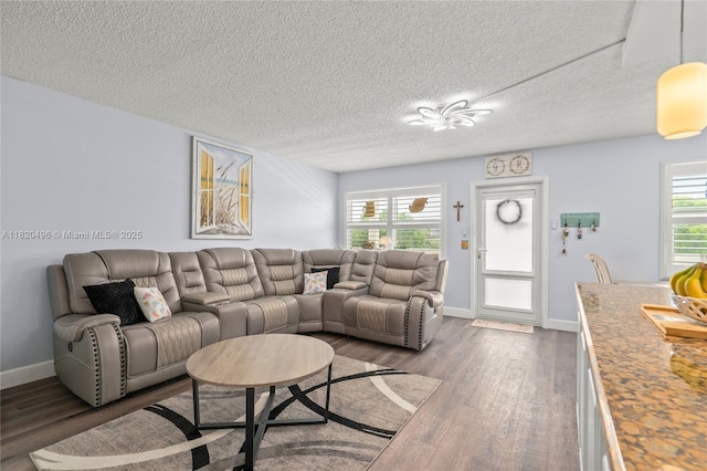 3021 Ellesmere B 3021, Deerfield Beach, FL 33442 - living area with dark wood finished floors, a textured ceiling, and healthy amount of natural light
