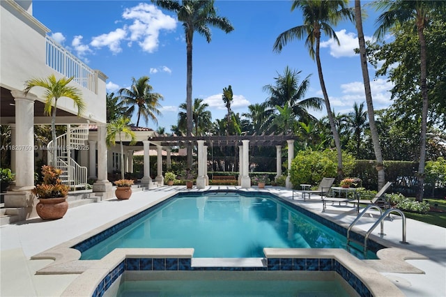 180 Solano Prado, Coral Gables, FL 33156 - view of pool with a pool with connected hot tub, a pergola, a patio, and stairway