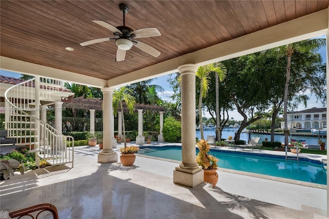 180 Solano Prado, Coral Gables, FL 33156 - swimming pool featuring ceiling fan, a patio, stairs, and a water view