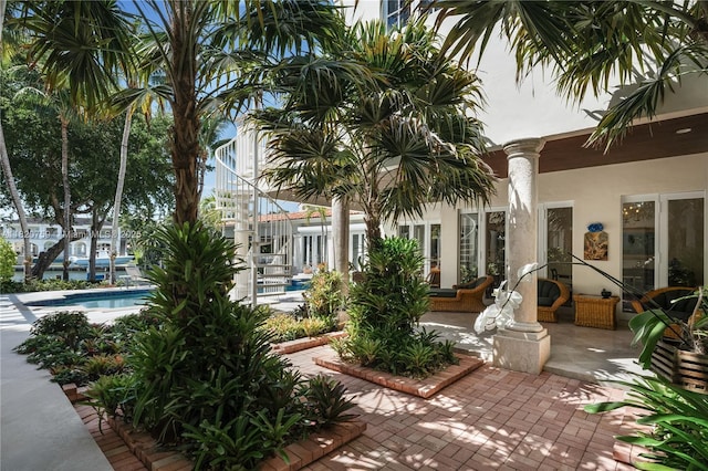 180 Solano Prado, Coral Gables, FL 33156 - view of patio featuring stairway and an outdoor pool