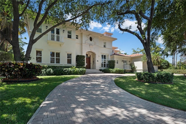 180 Solano Prado, Coral Gables, FL 33156 - mediterranean / spanish home with a chimney, a front yard, and stucco siding