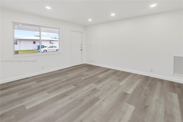 6675 NW 15th St, Margate, FL 33063 - unfurnished room featuring wood finished floors and recessed lighting