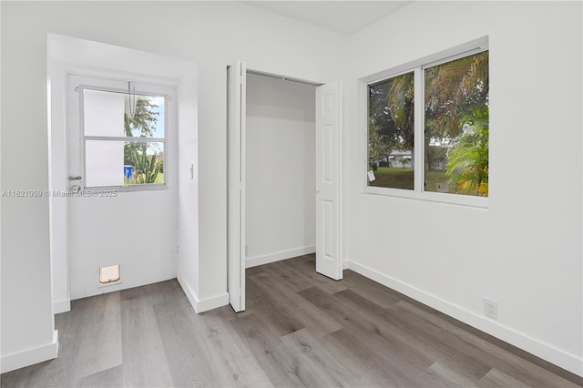 6675 NW 15th St, Margate, FL 33063 - unfurnished bedroom featuring wood finished floors and a closet