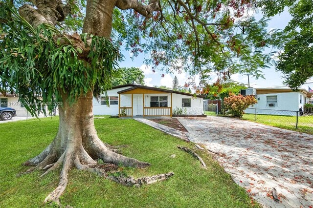5736 Simms St, Hollywood, FL 33021 - ranch-style home featuring concrete driveway