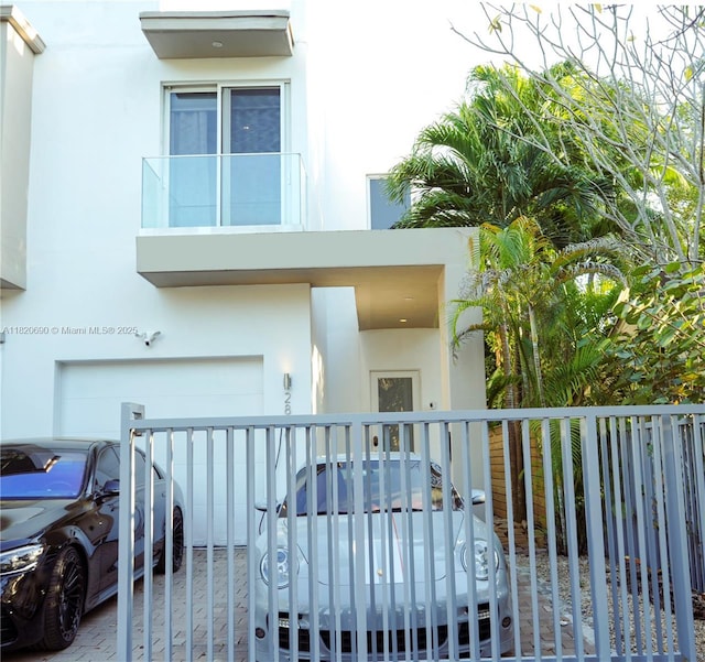 2836 W Trade Ave Unit 2836, Miami, FL 33133 - view of front of property featuring stucco siding and an attached garage