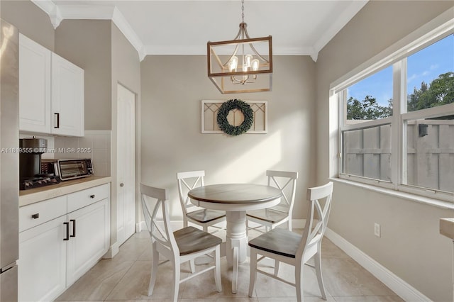 15201 SW 46th Ct, Miramar, FL 33027 - dining room featuring crown molding, a chandelier, and light tile patterned floors