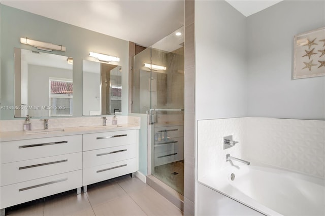 15201 SW 46th Ct, Miramar, FL 33027 - full bathroom with a bath, double vanity, a stall shower, and tile patterned flooring
