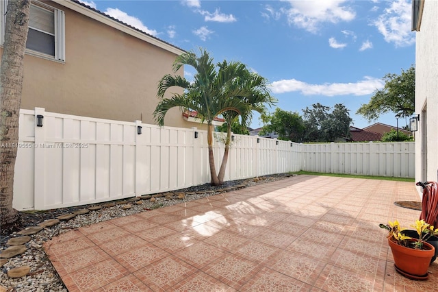 15201 SW 46th Ct, Miramar, FL 33027 - fenced backyard with a patio area