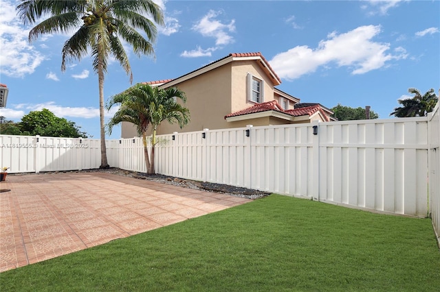 15201 SW 46th Ct, Miramar, FL 33027 - fenced backyard featuring a patio