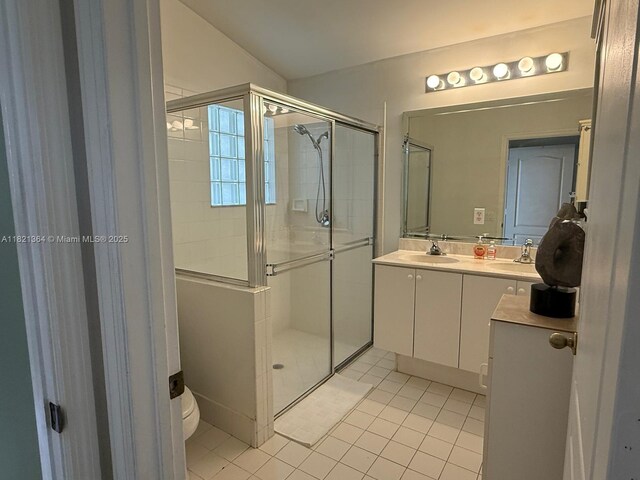 5657 NW 121st Ave, Coral Springs, FL 33076 - full bath featuring a shower stall, double vanity, and tile patterned flooring