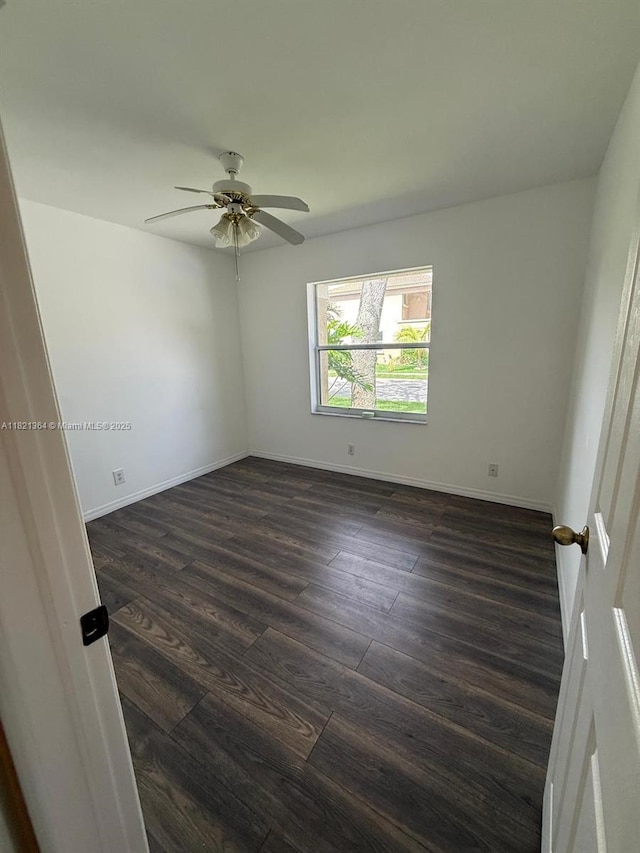 5657 NW 121st Ave, Coral Springs, FL 33076 - empty room with dark wood-style floors and a ceiling fan