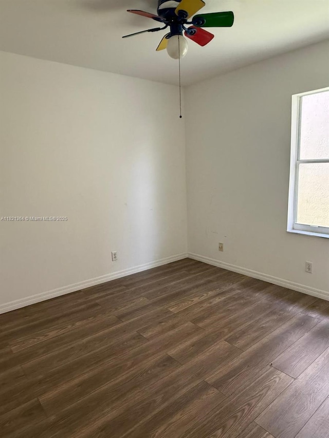 5657 NW 121st Ave, Coral Springs, FL 33076 - empty room featuring dark wood-style flooring and ceiling fan