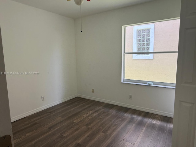 5657 NW 121st Ave, Coral Springs, FL 33076 - unfurnished room with dark wood-type flooring and ceiling fan
