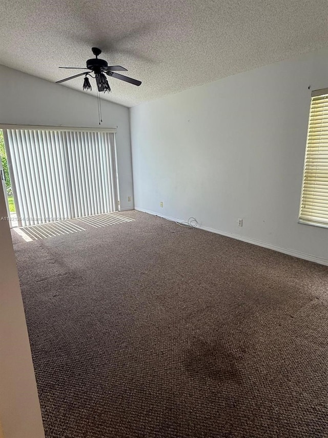 5657 NW 121st Ave, Coral Springs, FL 33076 - spare room with carpet flooring, a ceiling fan, and a textured ceiling