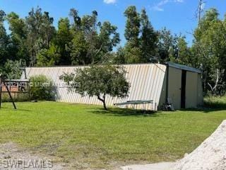 13001 Shetland Ln, Fort Myers, FL 33912 - view of yard featuring a shed