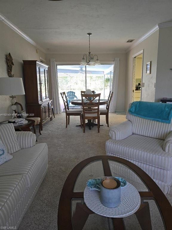 13001 Shetland Ln, Fort Myers, FL 33912 - living room with ornamental molding, light carpet, and a chandelier