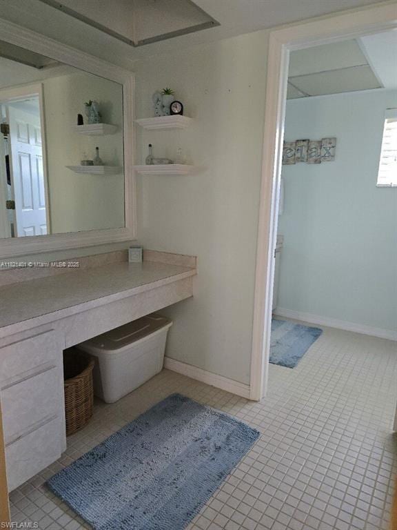 13001 Shetland Ln, Fort Myers, FL 33912 - bathroom with tile patterned flooring and baseboards