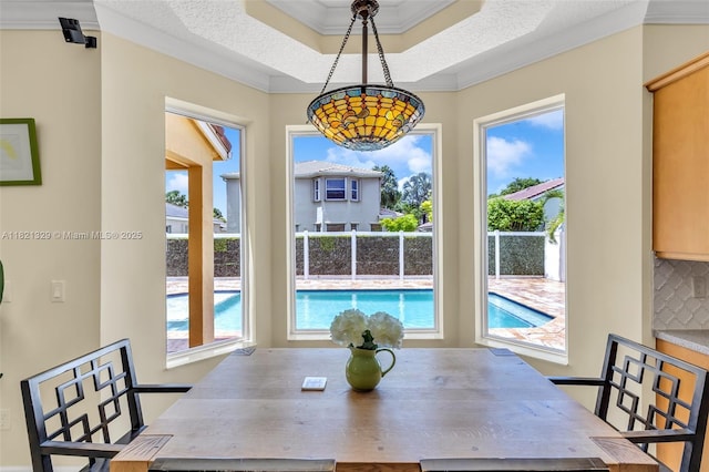 15631 SW 53rd St, Miramar, FL 33027 - dining space featuring ornamental molding and a raised ceiling