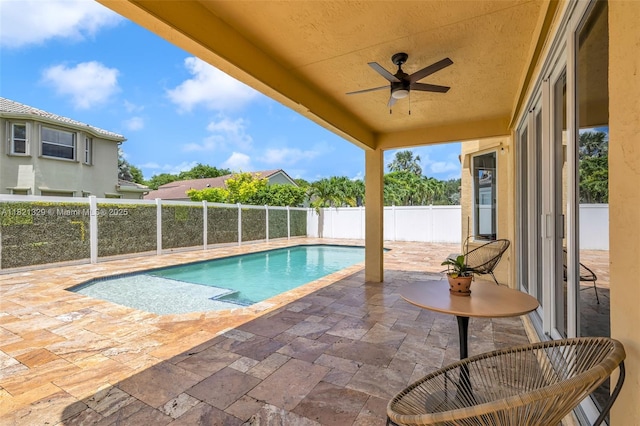 15631 SW 53rd St, Miramar, FL 33027 - view of swimming pool with a patio area, a ceiling fan, and a fenced backyard