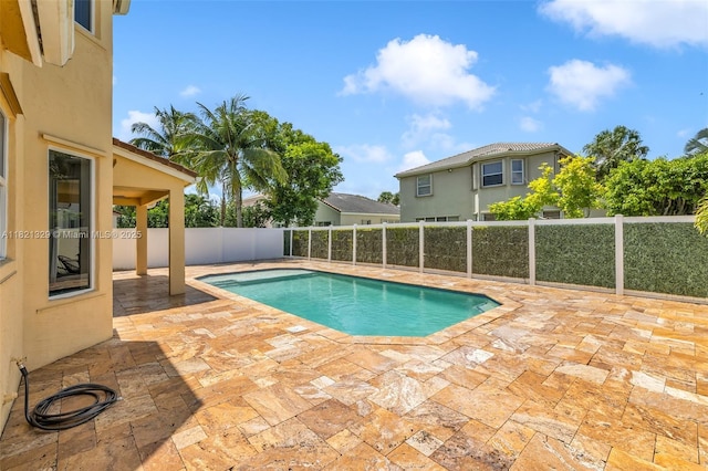 15631 SW 53rd St, Miramar, FL 33027 - view of swimming pool featuring a patio area and a fenced backyard