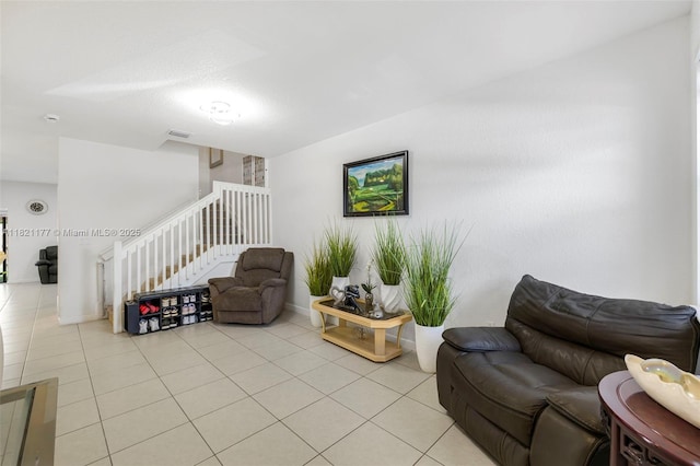 23404 SW 131st Ave, Homestead, FL 33032 - living room featuring light tile patterned floors and stairway