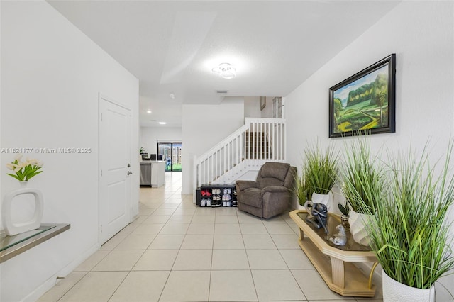 23404 SW 131st Ave, Homestead, FL 33032 - corridor with stairway and light tile patterned flooring