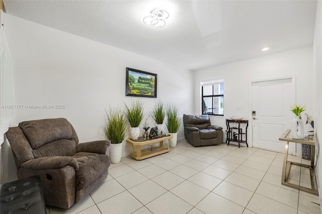 23404 SW 131st Ave, Homestead, FL 33032 - living room with light tile patterned floors and recessed lighting