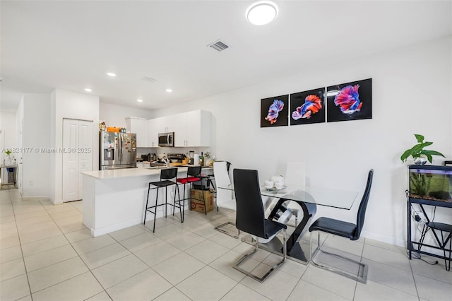 23404 SW 131st Ave, Homestead, FL 33032 - dining space featuring recessed lighting and light tile patterned floors