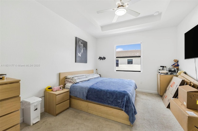 23404 SW 131st Ave, Homestead, FL 33032 - bedroom featuring light colored carpet, a raised ceiling, and a ceiling fan