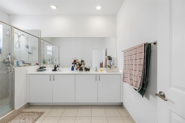 23404 SW 131st Ave, Homestead, FL 33032 - full bath with double vanity, a shower stall, tile patterned flooring, and recessed lighting